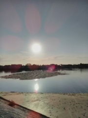 Orbes au-dessus d'une plage (44) lors d'un coucher de soleil à 17:55:55 Orbes au-dessus d'une plage (44) lors d'un coucher de soleil à 17:55:55